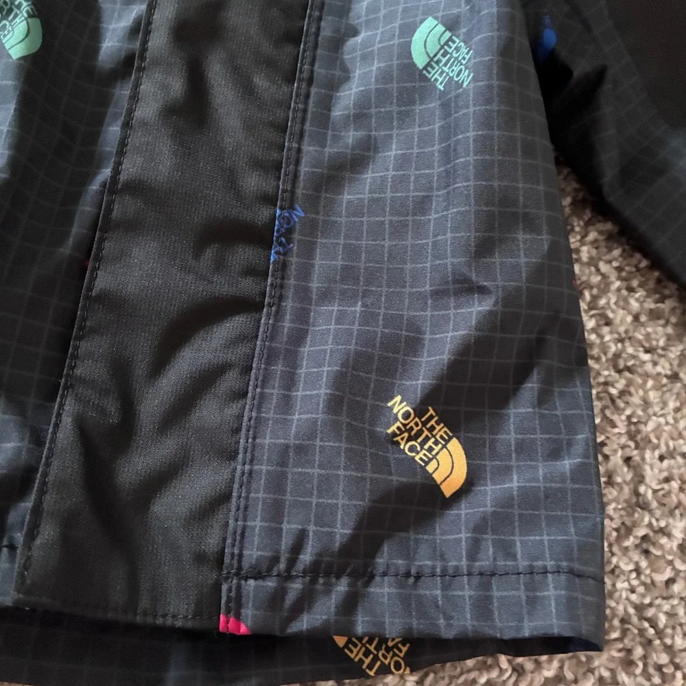 The North Face Baby DryVent Rain Jacket Black Multi Logo Grid Hooded 6-12M